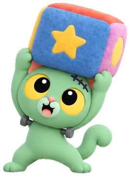 Frankie, a green Frankenstein kitten lifting a big soft toy block